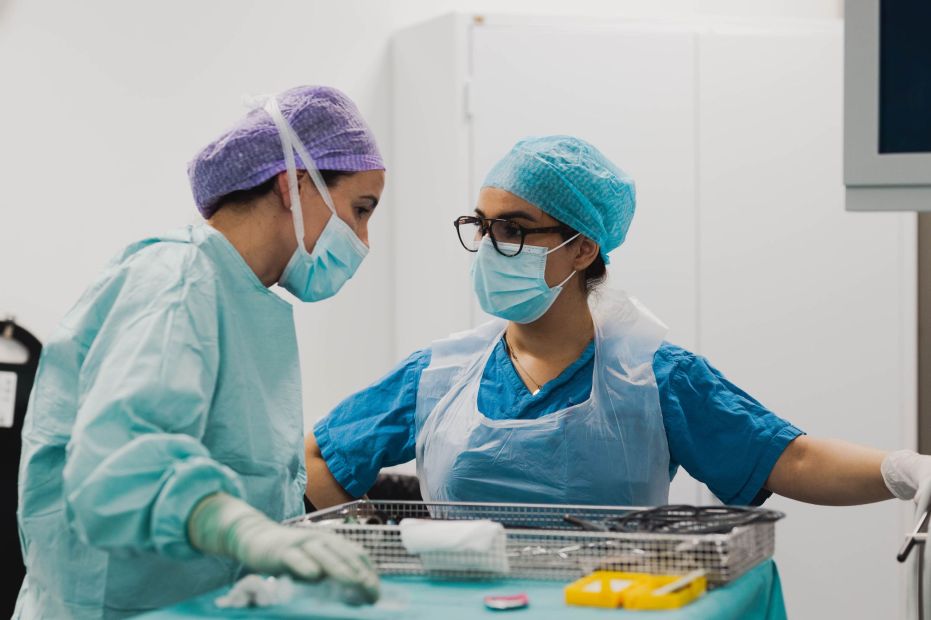The nurses prepare everything for the surgery